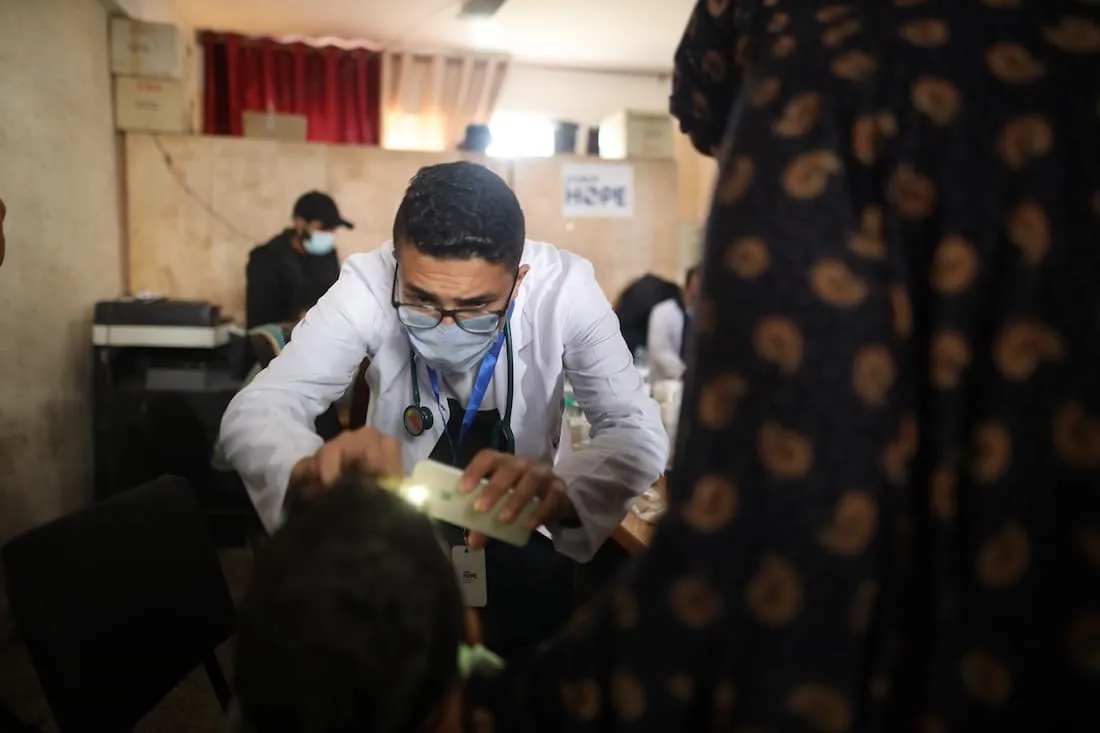 doctor treating child patient