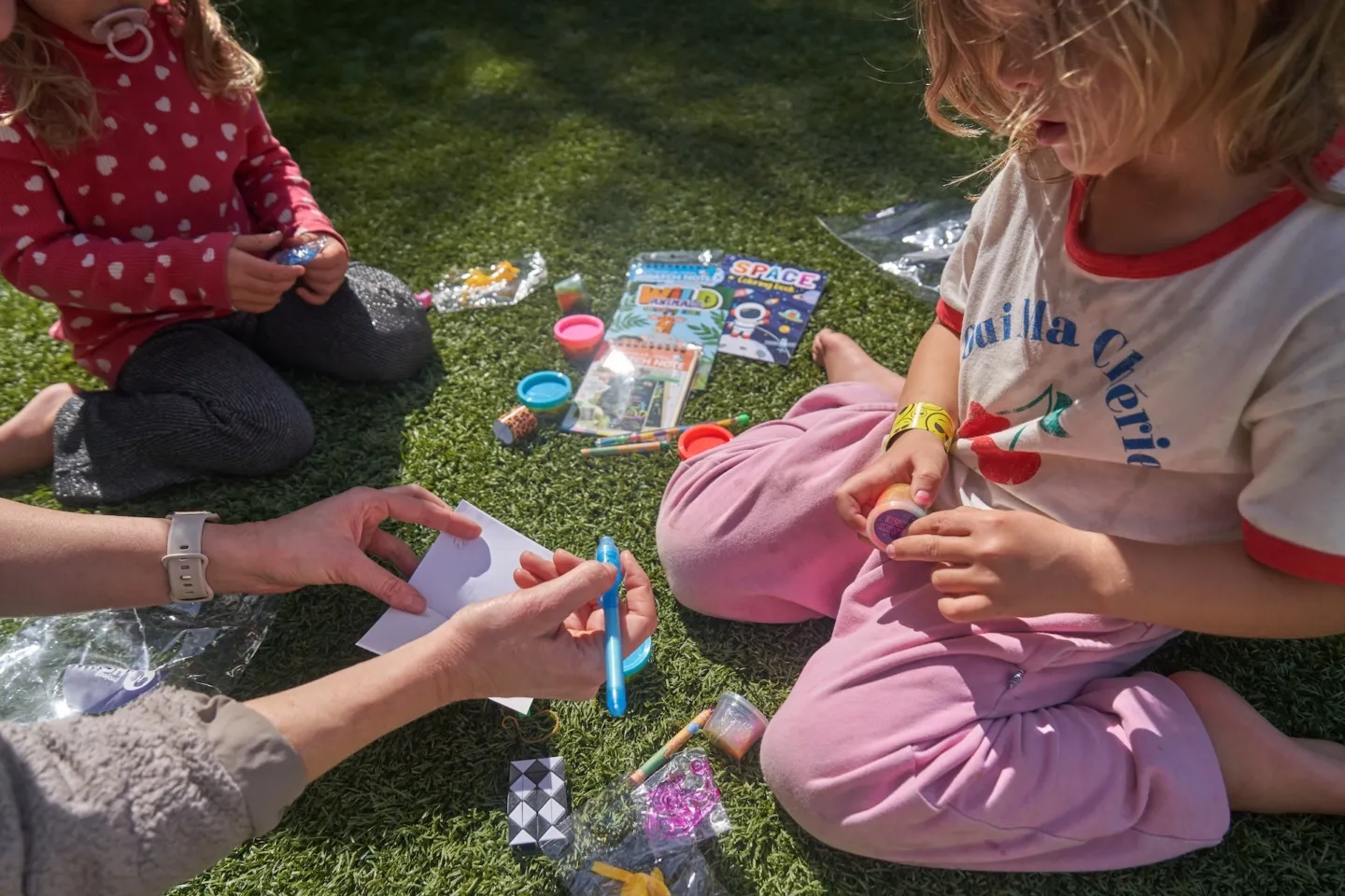 young children playing crafts