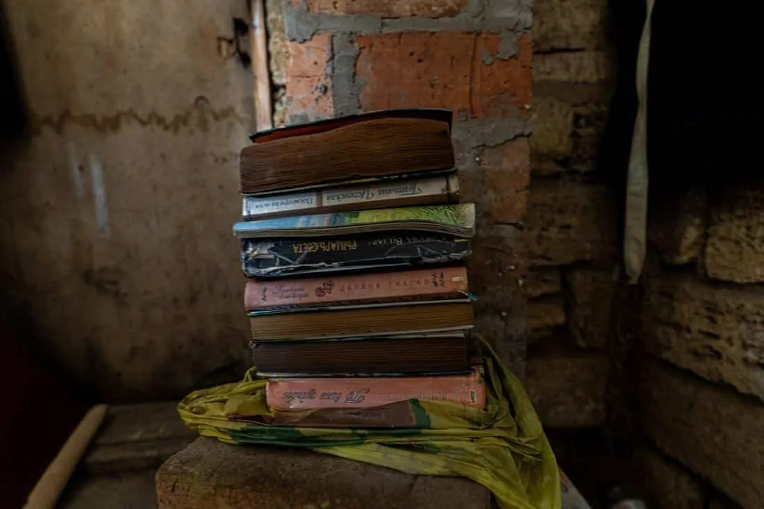 a stack of books with water damage