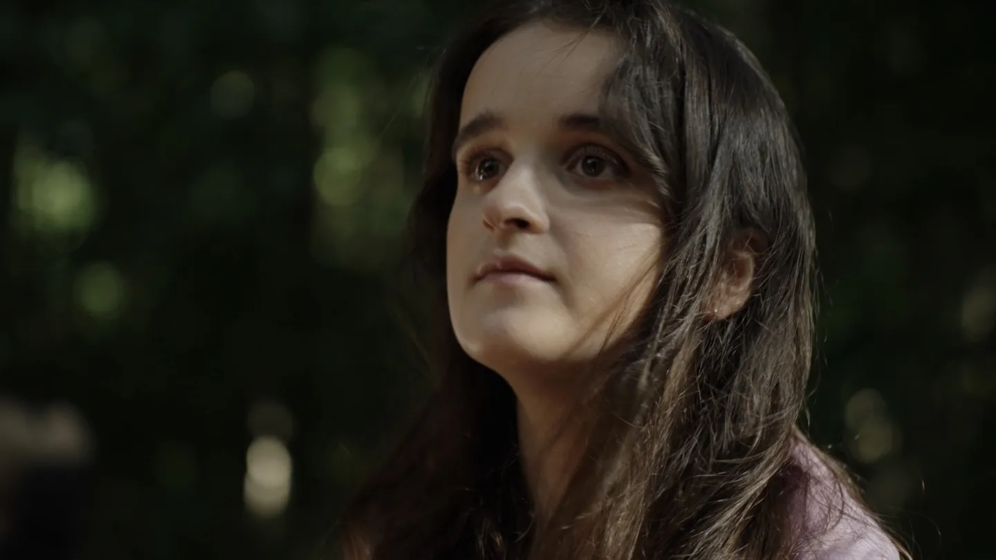 profile image of woman looking into distance