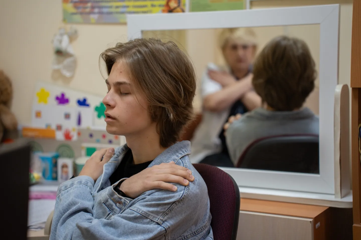 young boy practicing breathing exercises