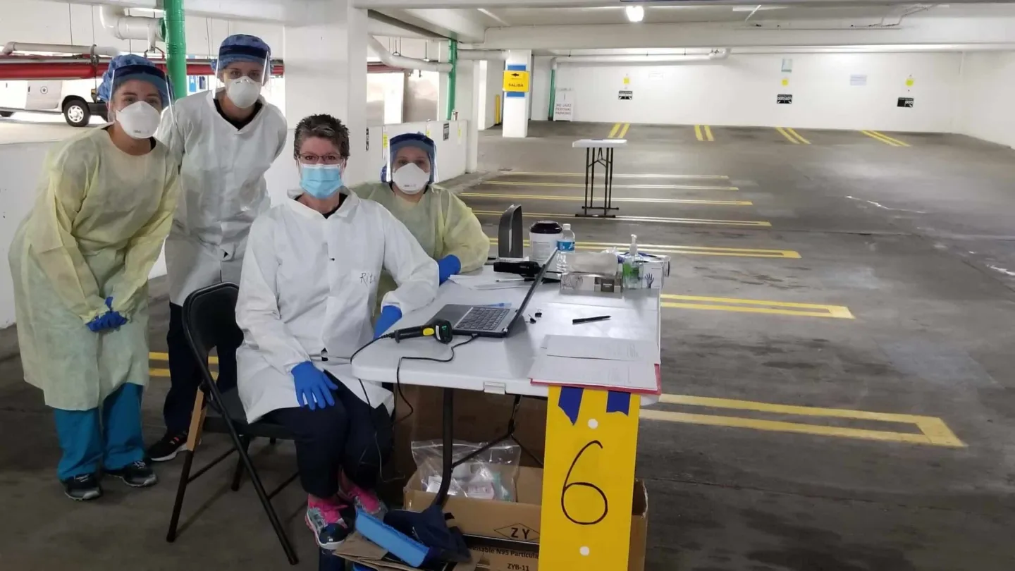 group of nurses in full PPE