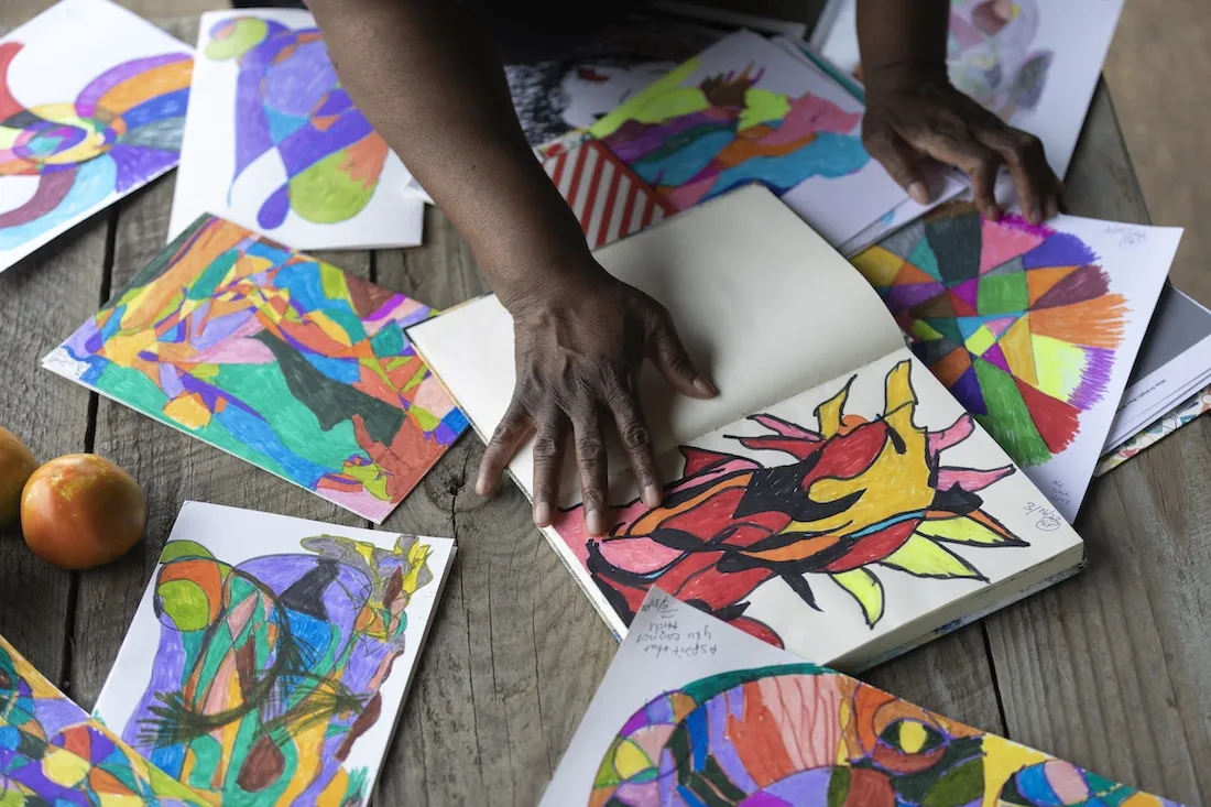 Paula with her art in Atlanta