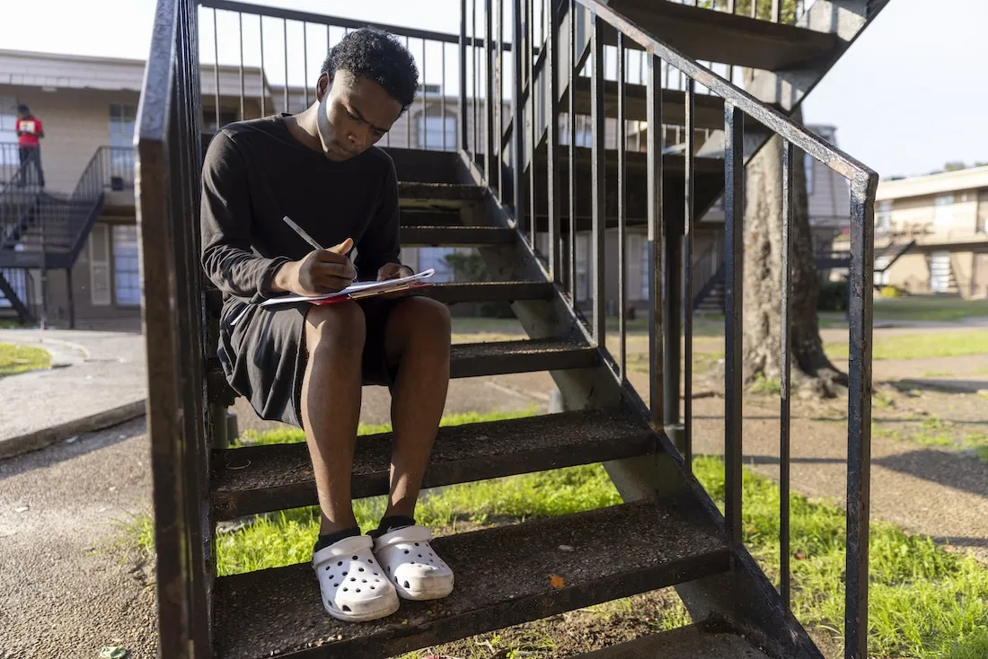 Young man signing up to be vaccinated in Houston